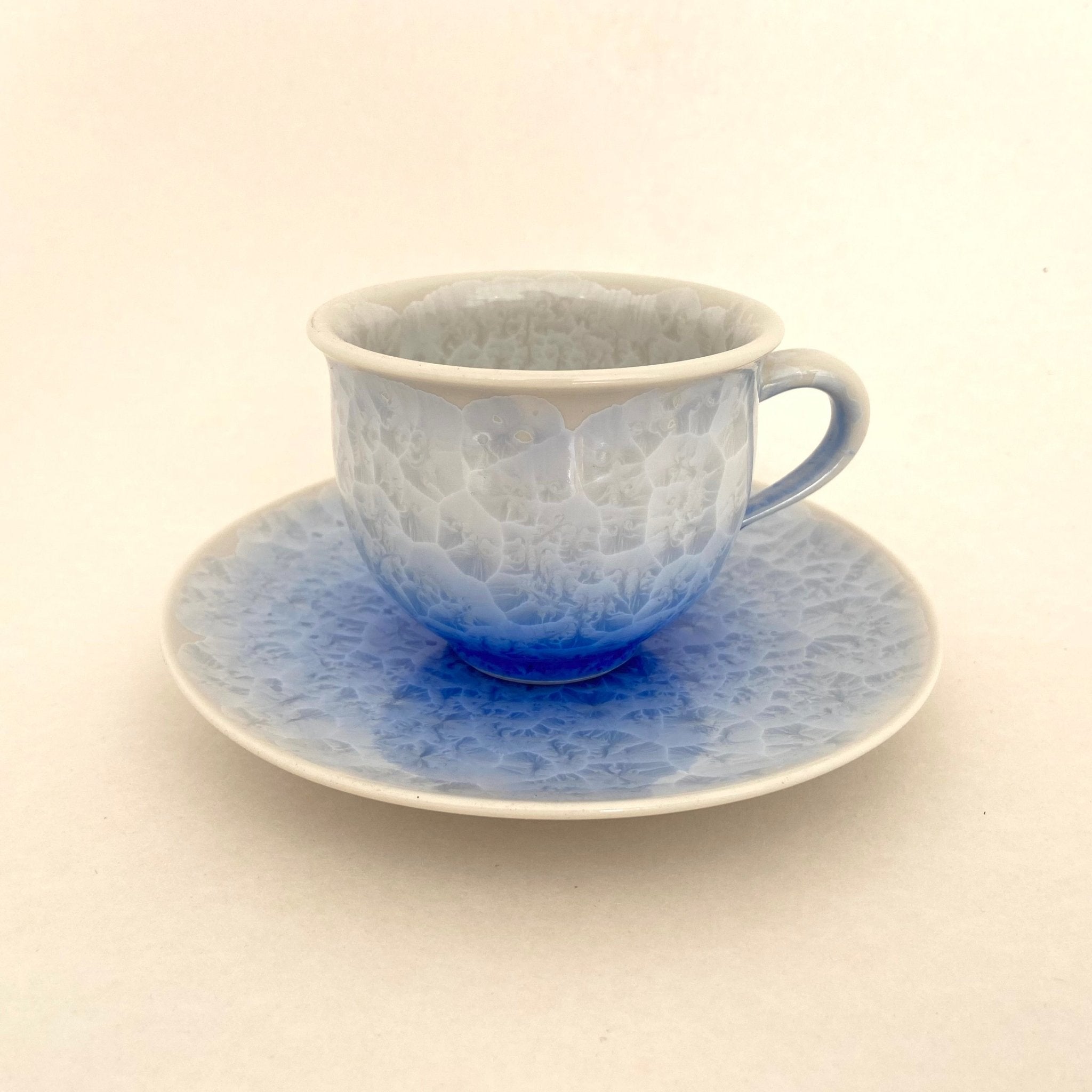 https://tearepertoire.com/cdn/shop/products/blue-flower-crystal-tea-cup-saucer-640182_2048x.jpg?v=1661608100